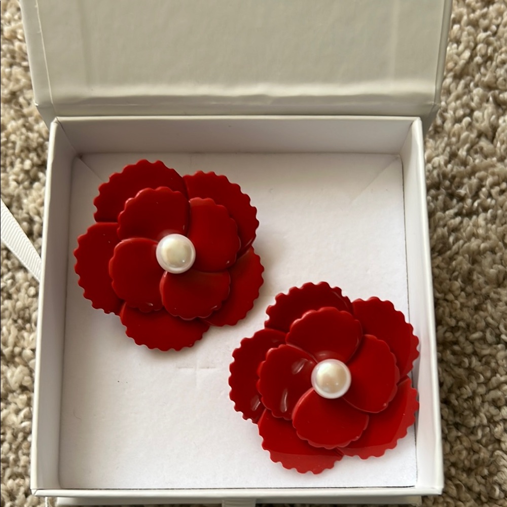 Nicola Bathie poppy earrings.